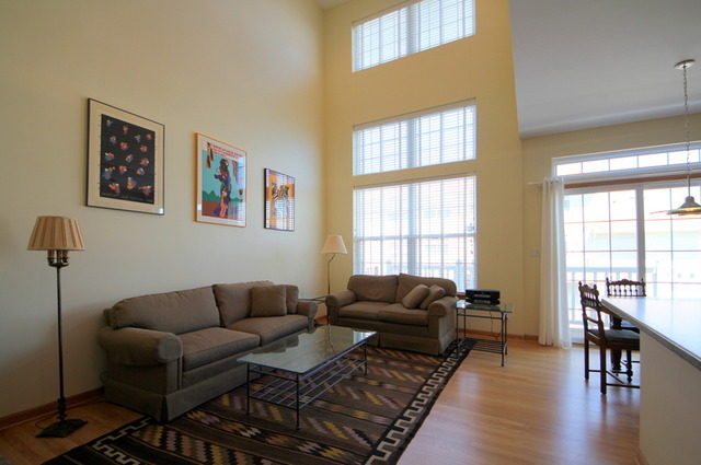 1283 Georgetown Way Vernon Hills, IL 60061 - Photo 14 of 25 a living room with furniture and a window