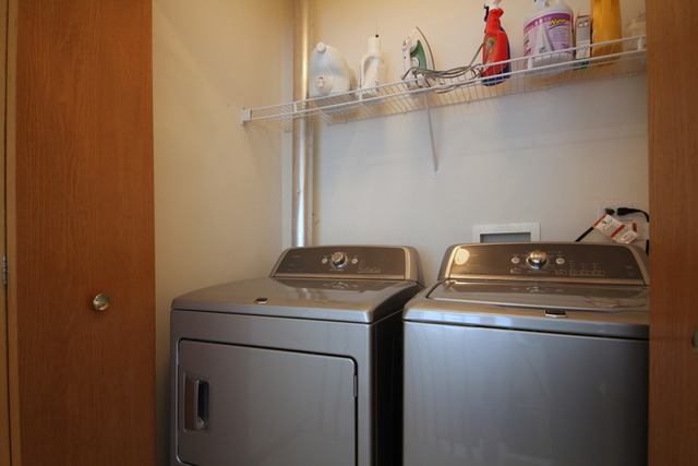 1283 Georgetown Way Vernon Hills, IL 60061 - Photo 23 of 25 a utility room with dryer and washer