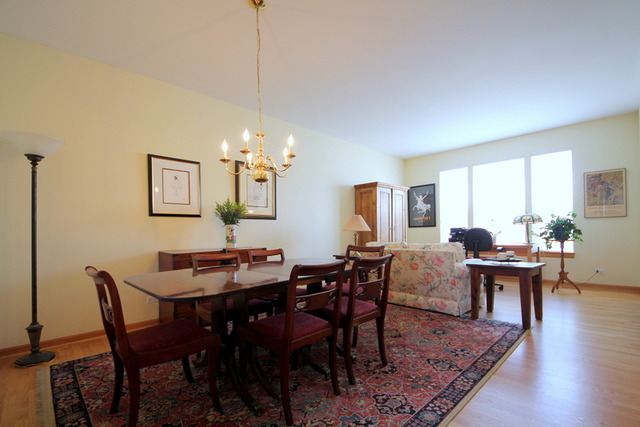 1283 Georgetown Way Vernon Hills, IL 60061 - Photo 5 of 25 a view of a dining room with furniture window and wooden floor