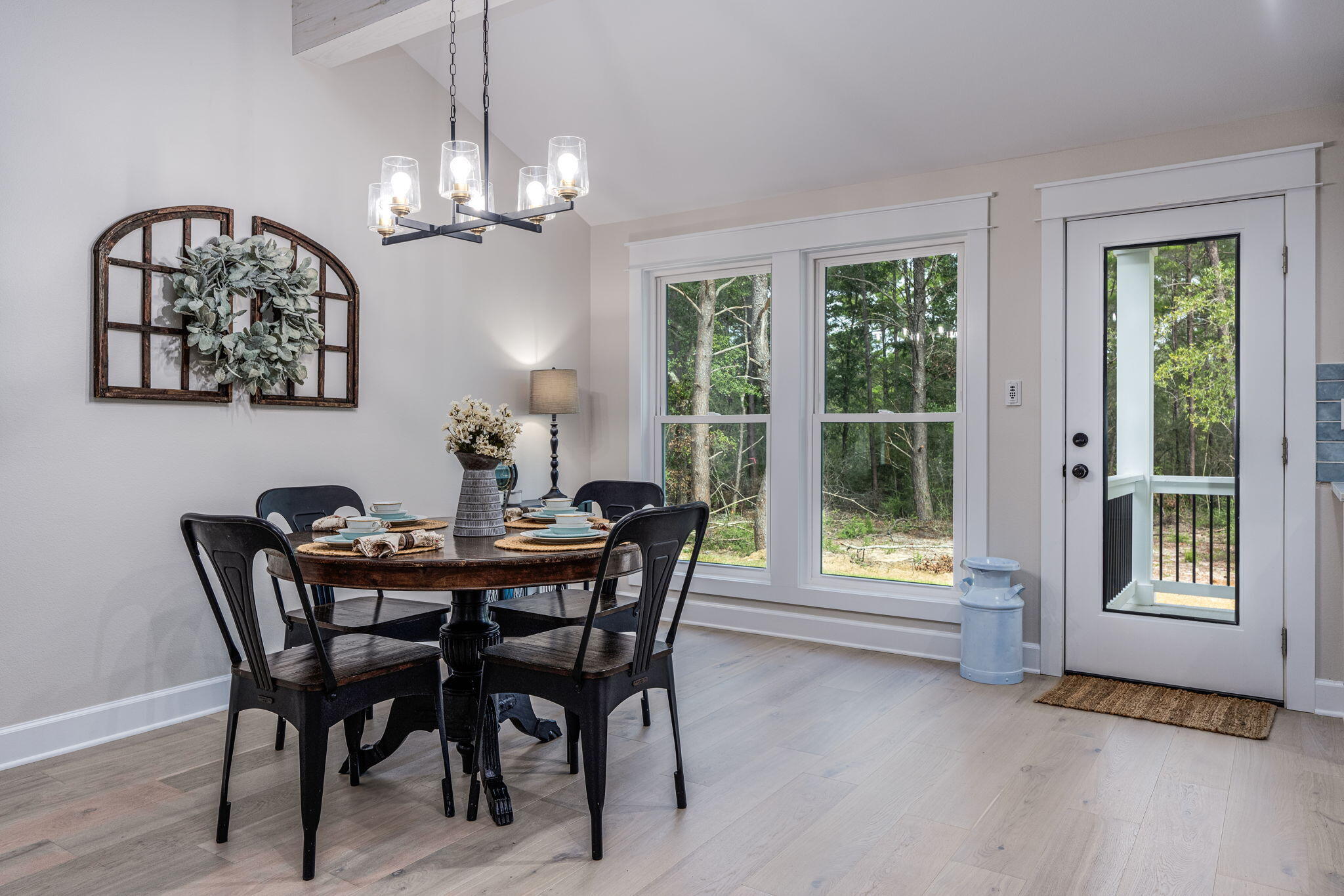 89 Spring Hill Road DeFuniak Springs, FL 32433 - Photo 17 of 73 a view of a dining room with furniture window and wooden floor