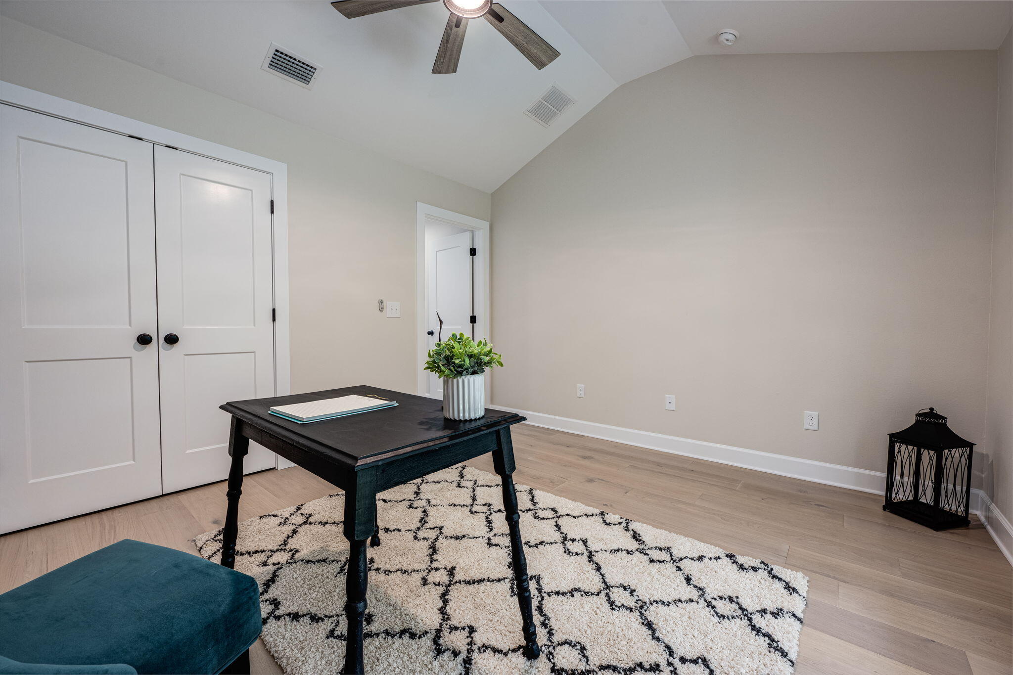 89 Spring Hill Road DeFuniak Springs, FL 32433 - Photo 26 of 73 a room with a table and chairs