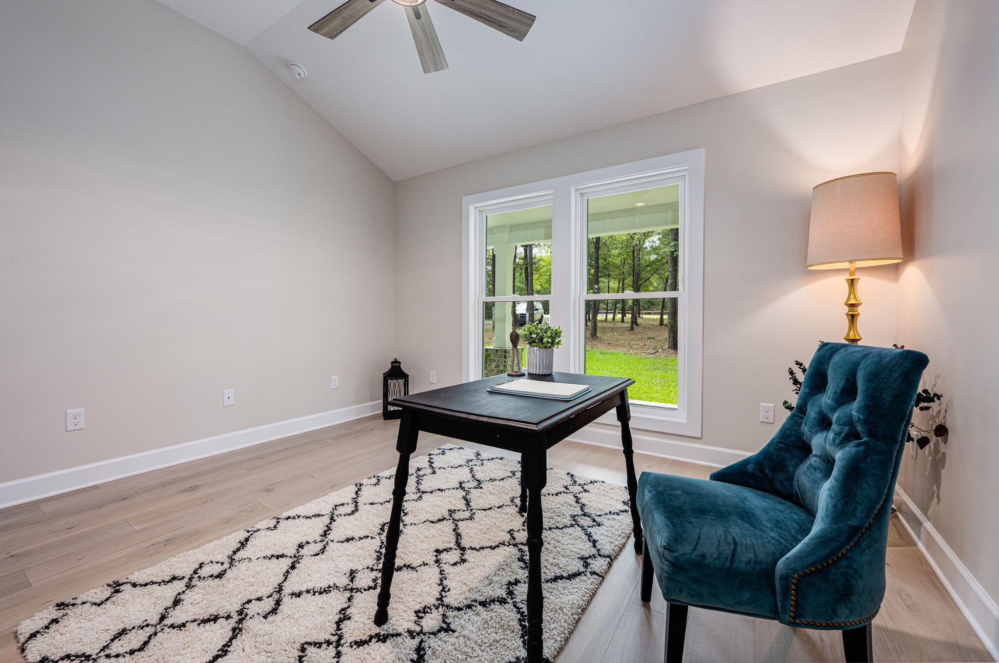 89 Spring Hill Road DeFuniak Springs, FL 32433 - Photo 27 of 73 a living room with furniture and a window