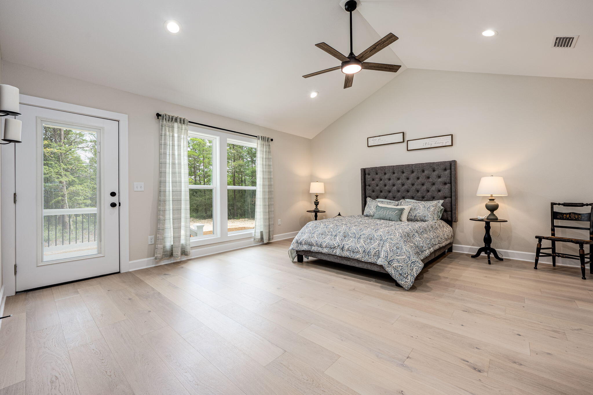 89 Spring Hill Road DeFuniak Springs, FL 32433 - Photo 36 of 73 a bedroom with a large bed and a large window