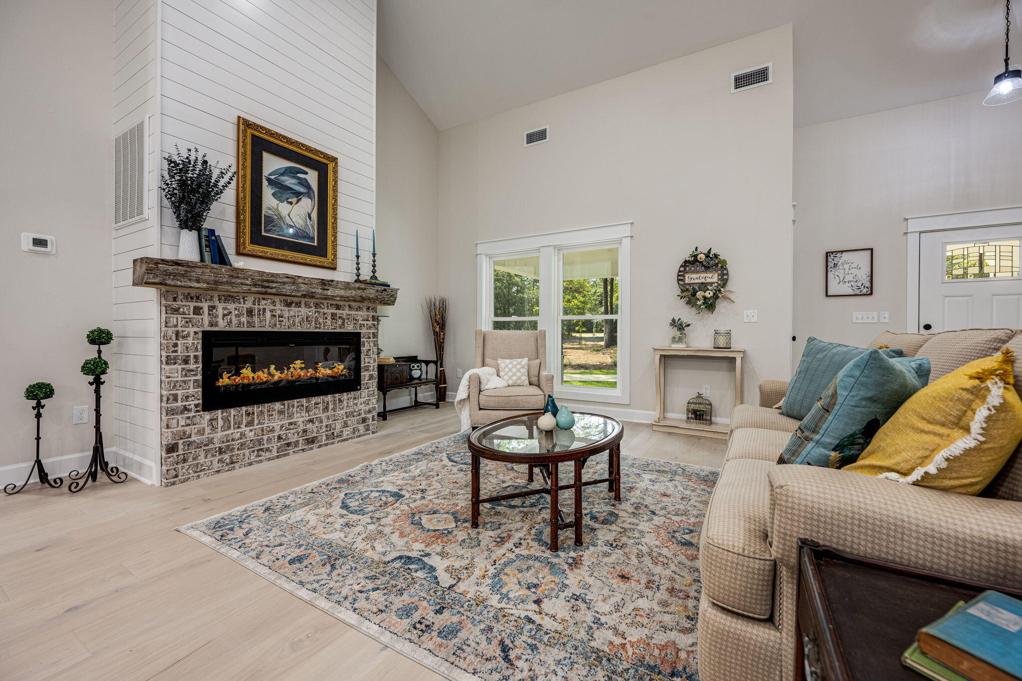 89 Spring Hill Road DeFuniak Springs, FL 32433 - Photo 4 of 73 a living room with furniture and a fireplace