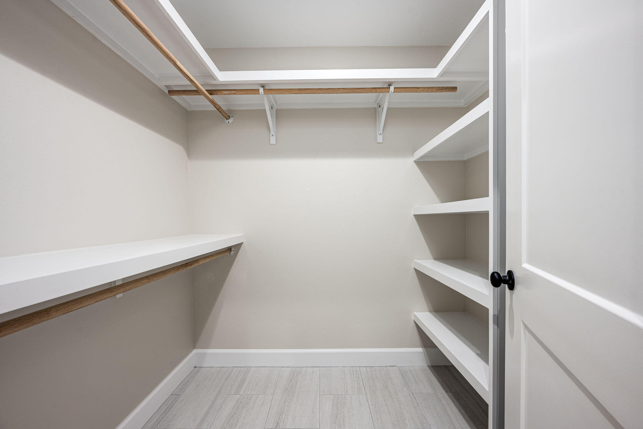 89 Spring Hill Road DeFuniak Springs, FL 32433 - Photo 49 of 73 a view of walk in closet with empty racks