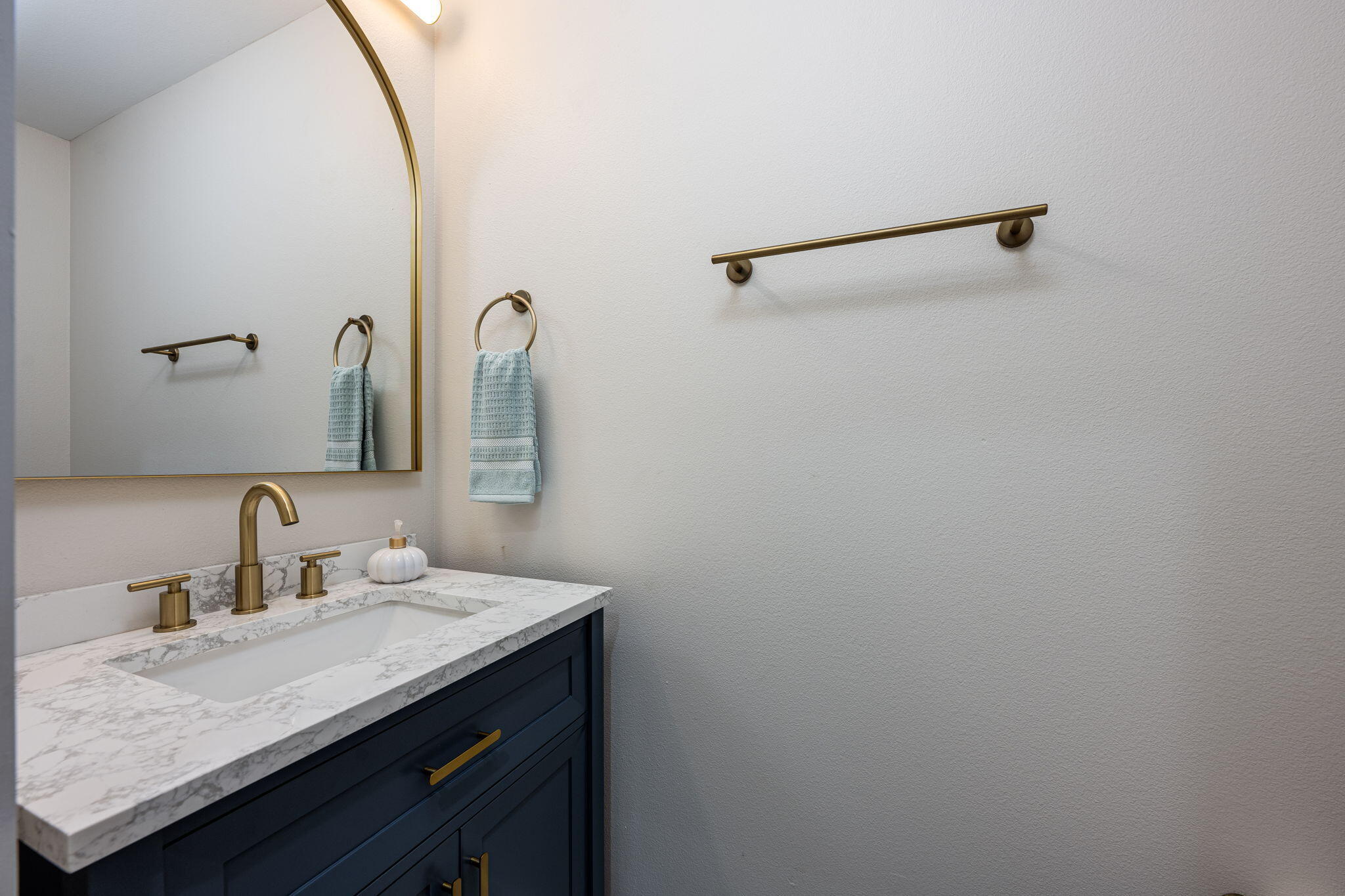89 Spring Hill Road DeFuniak Springs, FL 32433 - Photo 56 of 73 a close up of a sink and a mirror