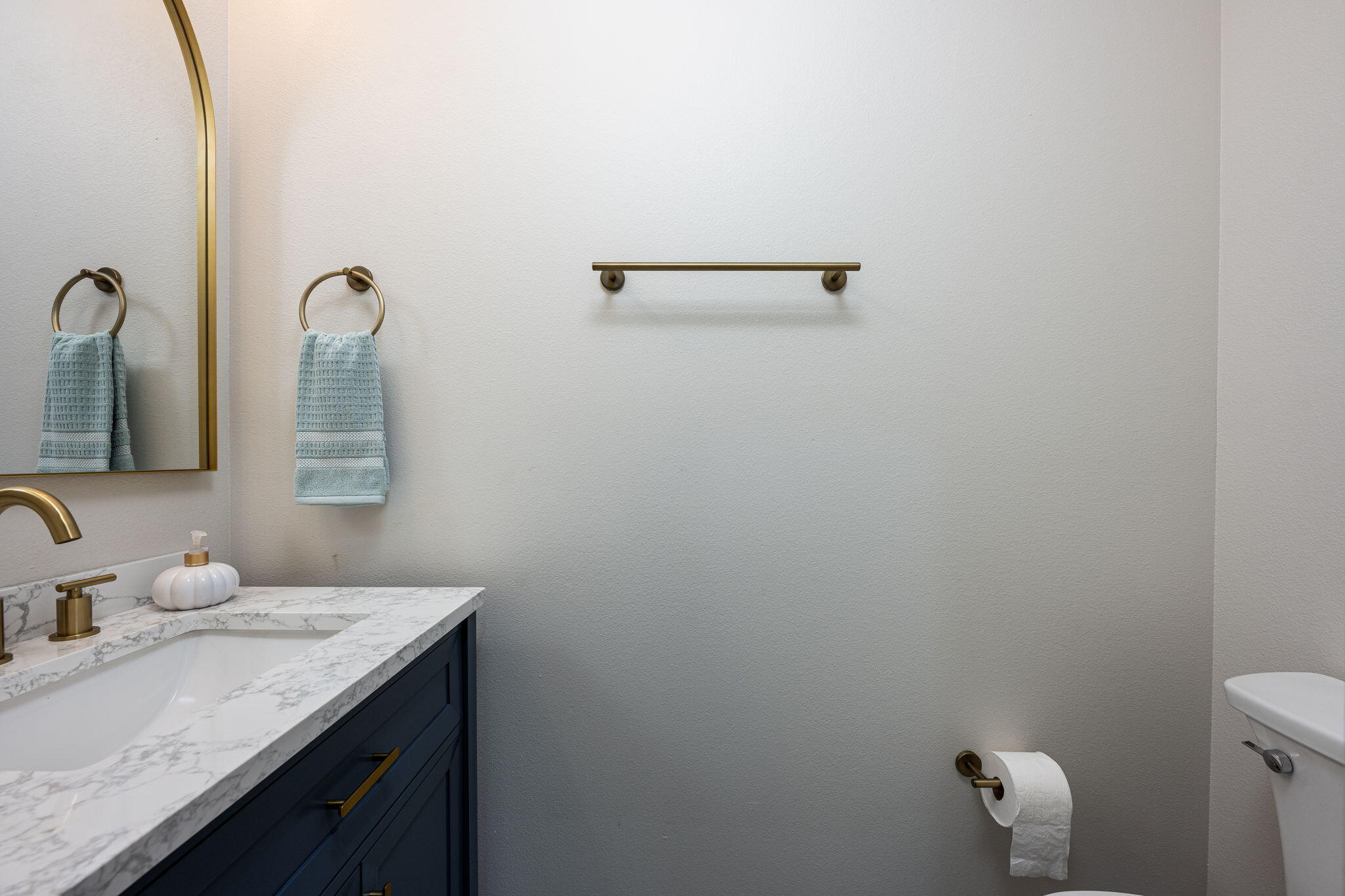 89 Spring Hill Road DeFuniak Springs, FL 32433 - Photo 57 of 73 a bathroom with a granite countertop sink and a mirror