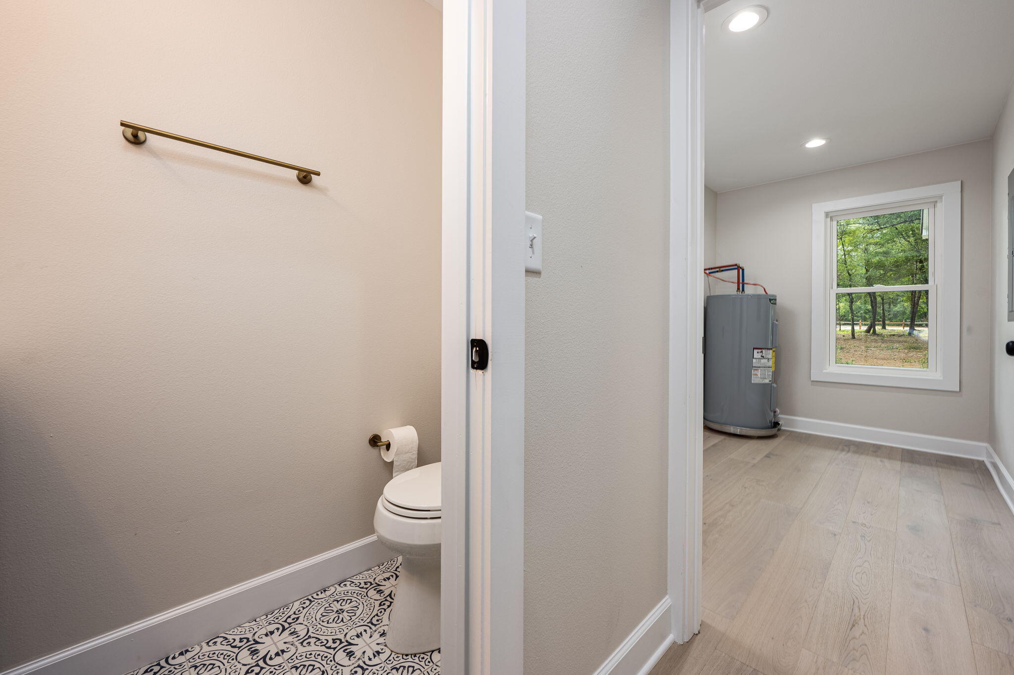 89 Spring Hill Road DeFuniak Springs, FL 32433 - Photo 58 of 73 a bathroom with a toilet and a shower