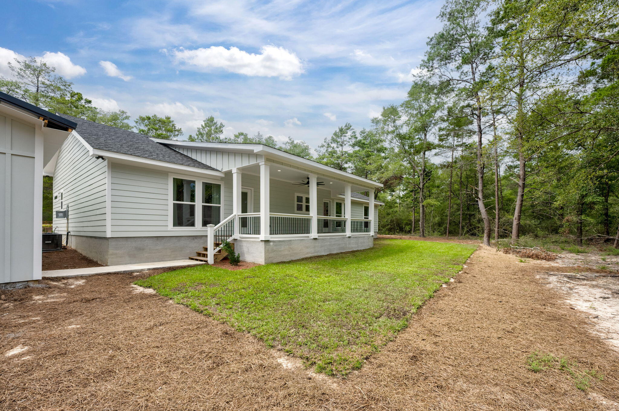 89 Spring Hill Road DeFuniak Springs, FL 32433 - Photo 64 of 73 a view of a house with a yard