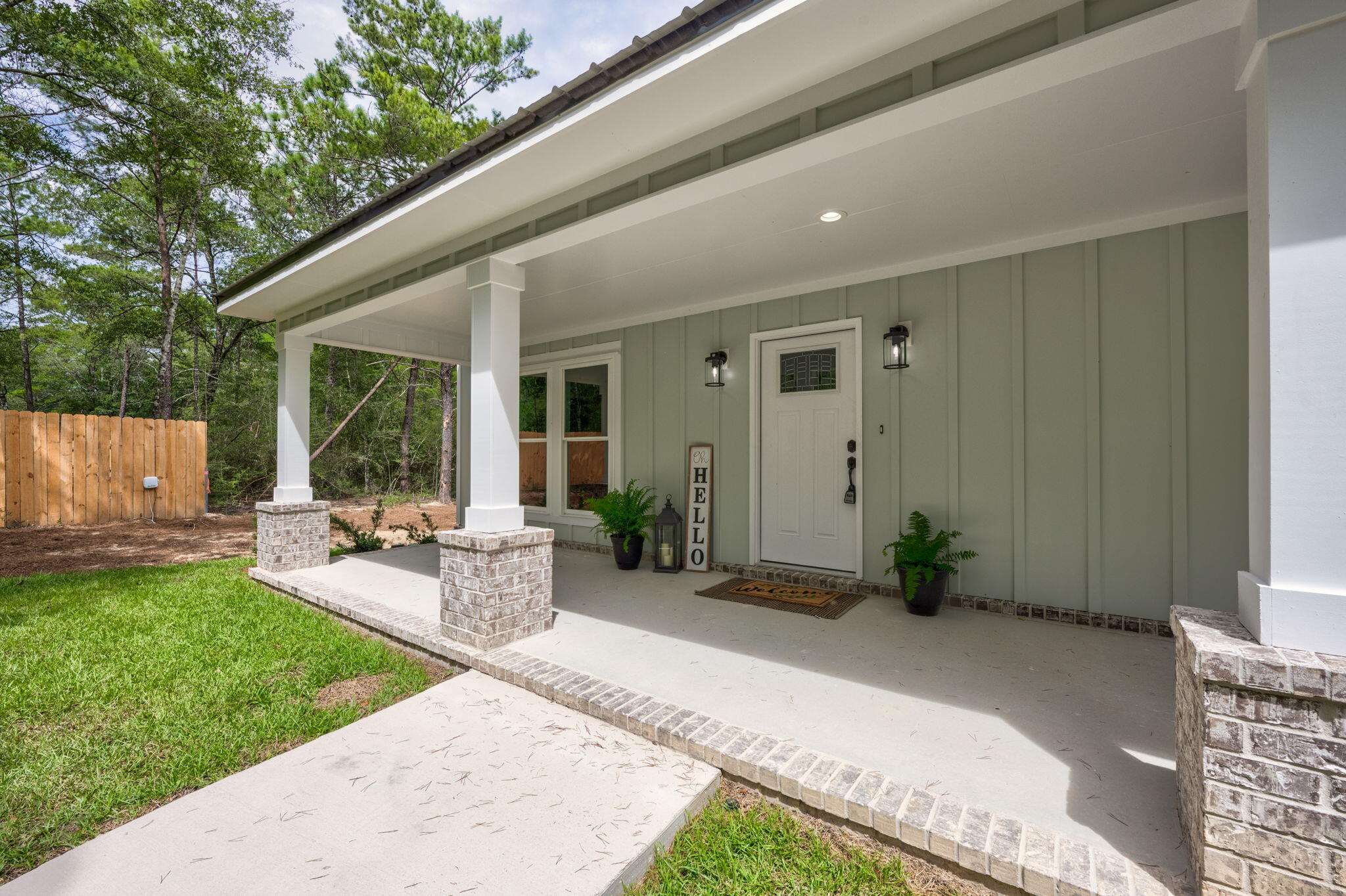 89 Spring Hill Road DeFuniak Springs, FL 32433 - Photo 72 of 73 a view of a house with backyard and sitting area