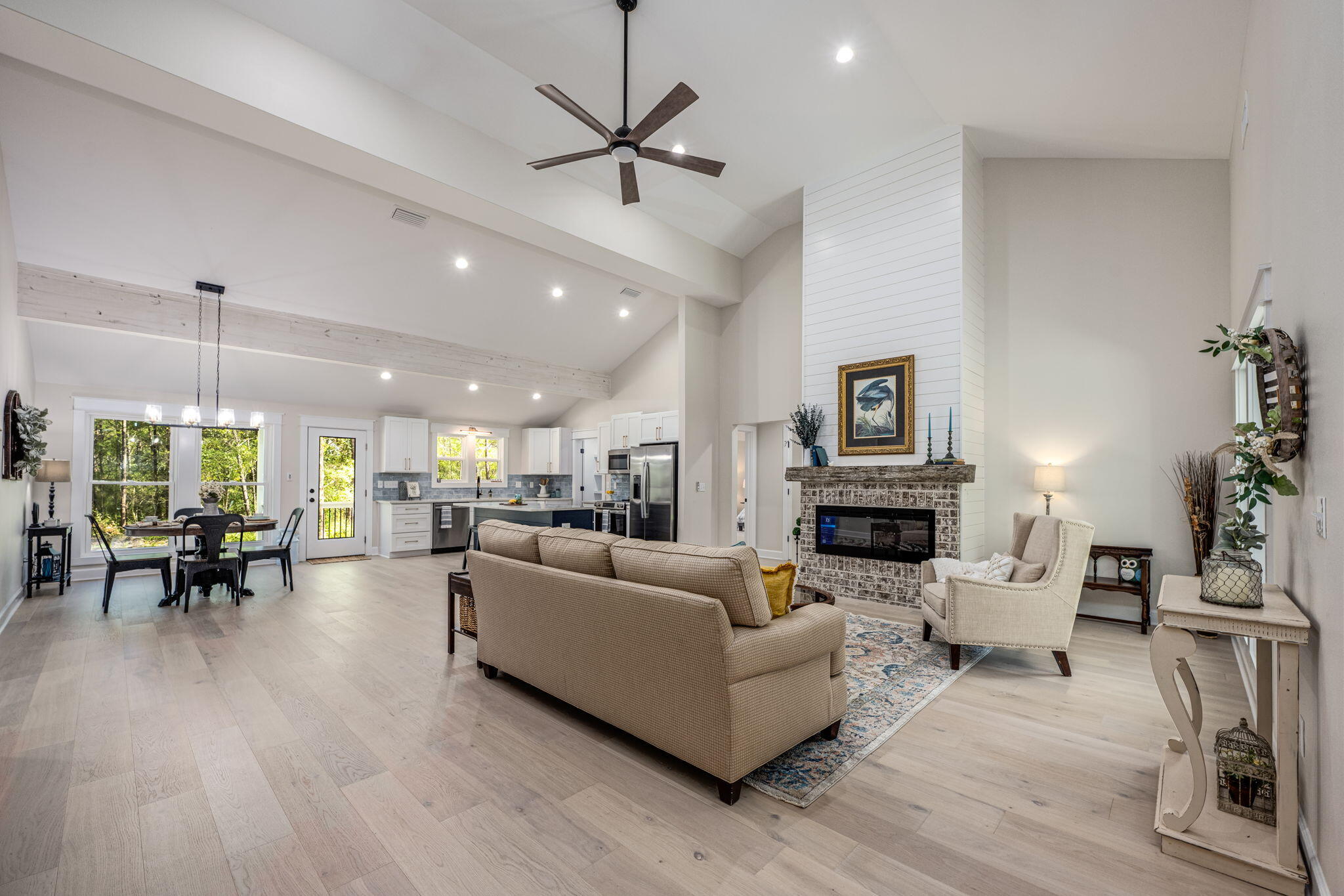 89 Spring Hill Road DeFuniak Springs, FL 32433 - Photo 8 of 73 a living room with fireplace furniture and a wooden floor