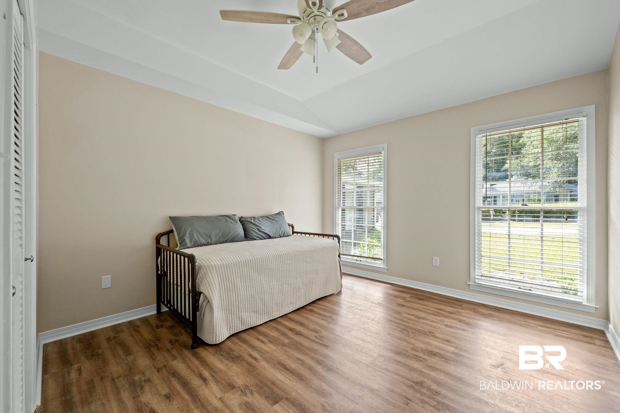 110 Ferncliff Circle Daphne, AL 36526 - Photo 24 of 40 Bedroom with wood finished floors, baseboards, vaulted ceiling, and a ceiling fan