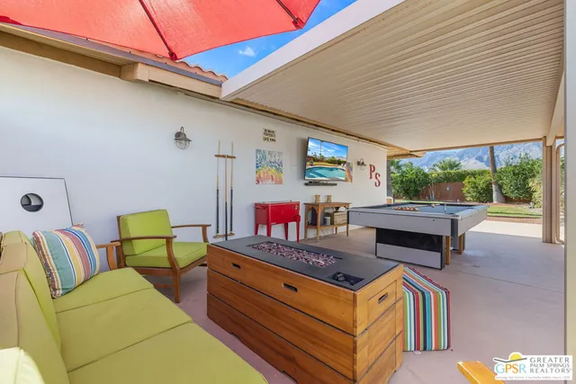 a room with furniture and a window