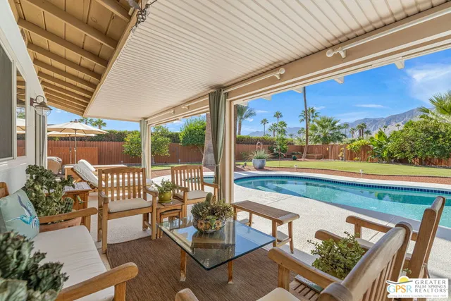 a living room with patio
