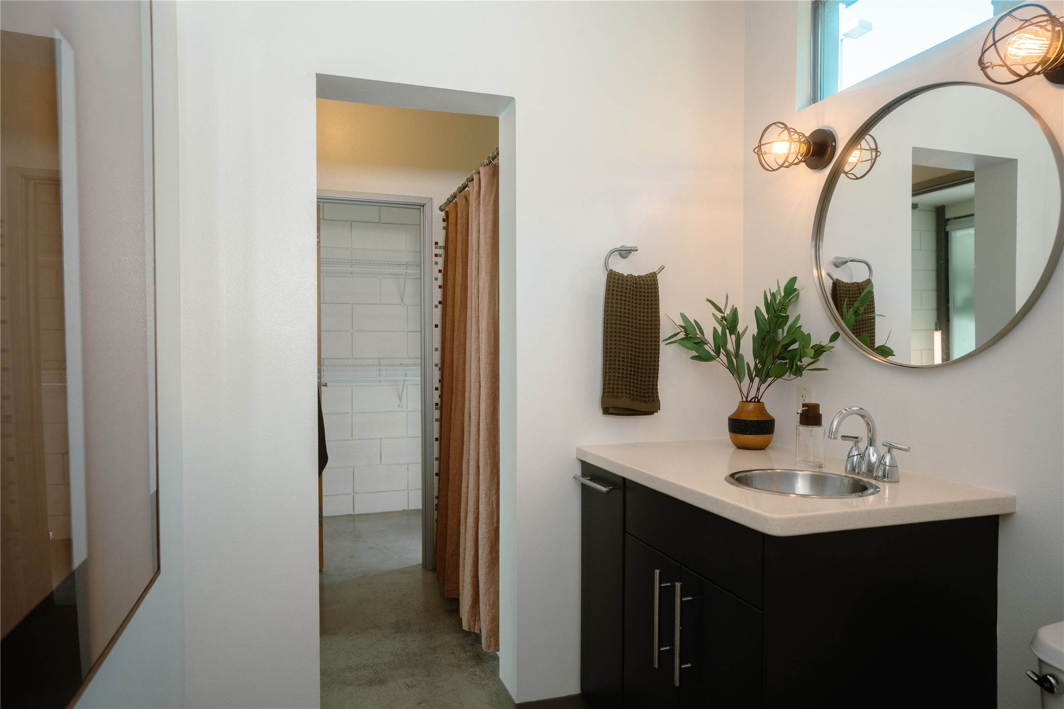4801 South Congress Avenue, Unit H5 Austin, TX 78745 - Photo 24 of 39 Bathroom featuring vanity, concrete floors, and a shower with curtain