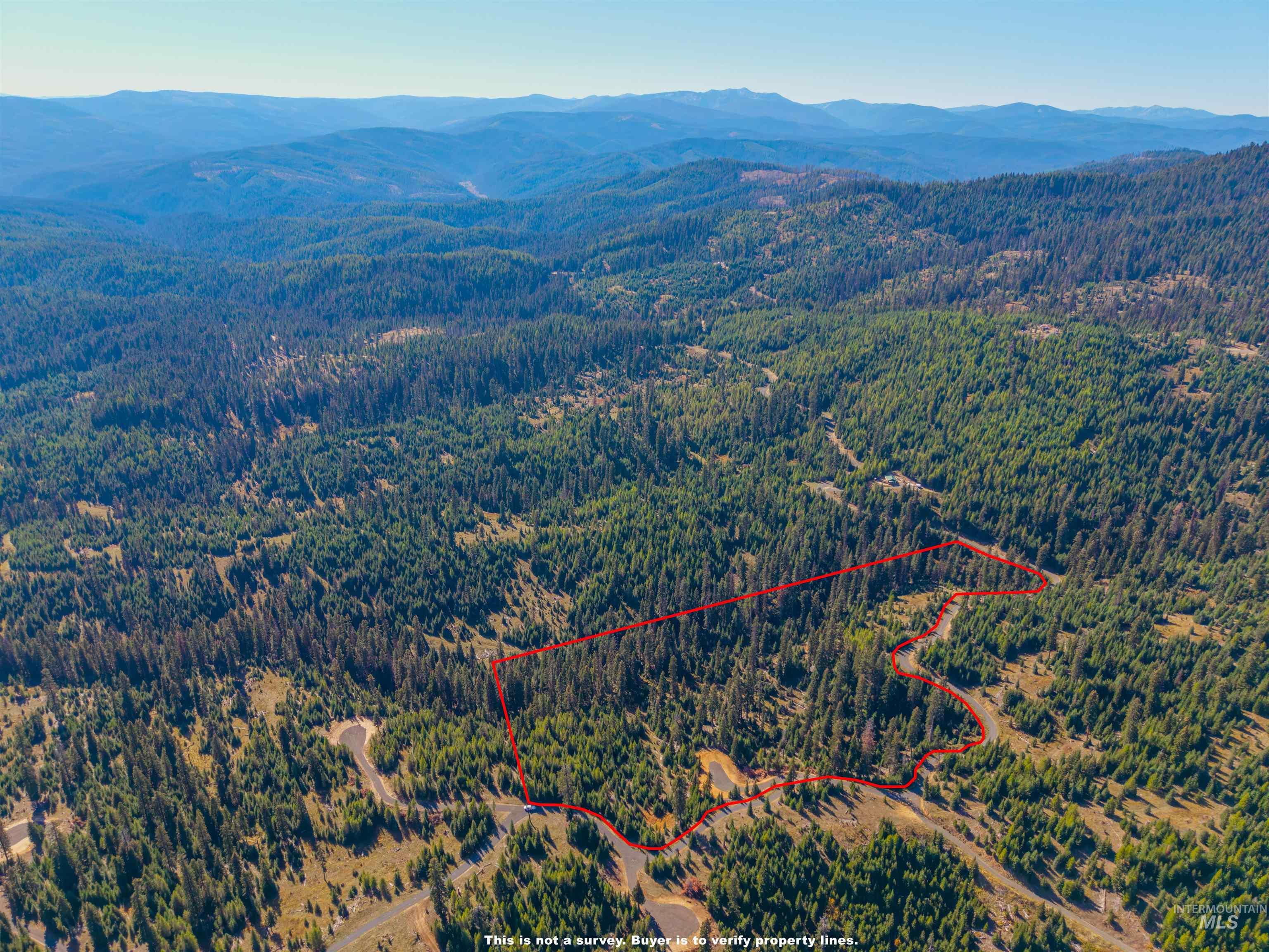 2 Tree Farm Trails Road Elk City, ID 83525 - Photo 4 of 6 Aerial overview of property's location with a mountainous background and property boundaries highlighted