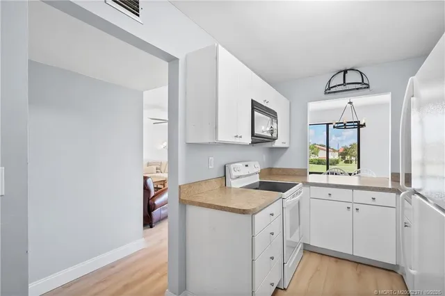 $245,000 | 5355 Southeast Miles Grant Road, Unit E212, Stuart, FL 34997