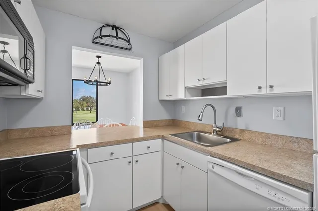 $245,000 | 5355 Southeast Miles Grant Road, Unit E212, Stuart, FL 34997