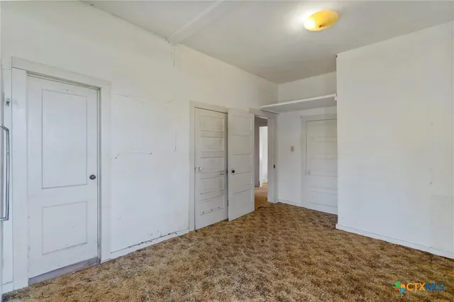 a bathroom with a bathtub and a toilet