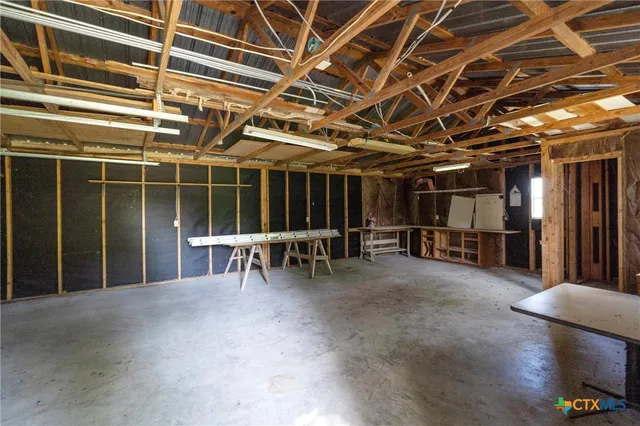 a view of outdoor space with deck and trees