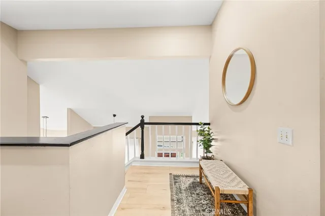 a bathroom with a sink a large mirror and a bathtub