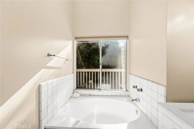 a view of a balcony with wooden floor