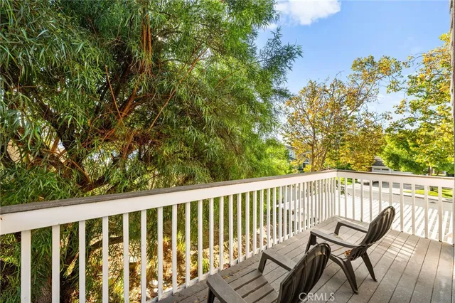 a bedroom with a bed and a desk