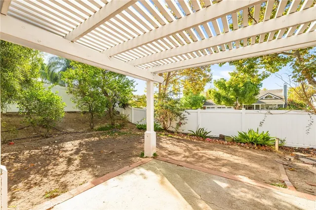 a view of a backyard with a patio
