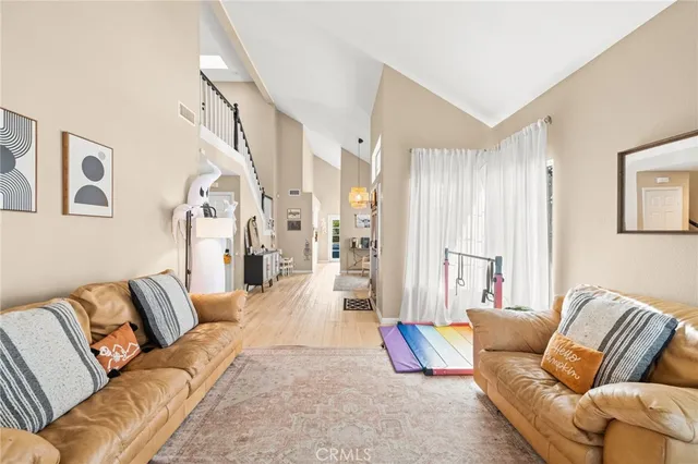 a living room with furniture and a couch
