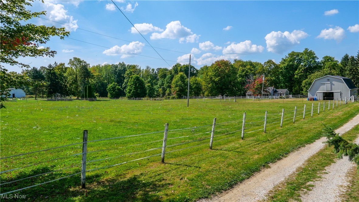 6916 Dewey Road Thompson, OH 44086 - Photo 39 of 49 View of property's community with a view of countryside and an outdoor structure