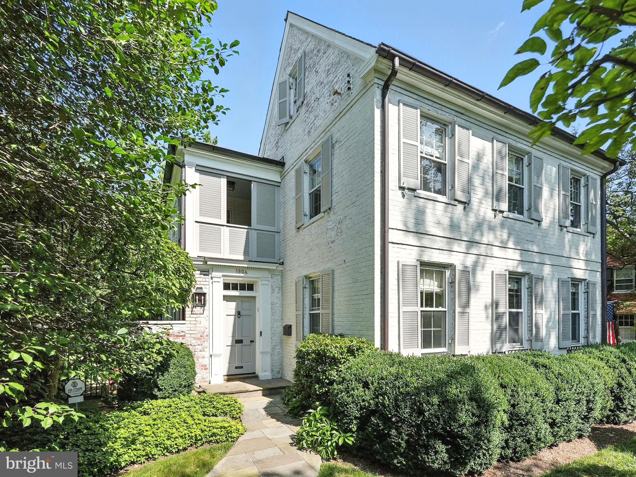 1804 45th Street Northwest Washington, DC 20007 - Photo 1 of 52 a front view of a house with a yard