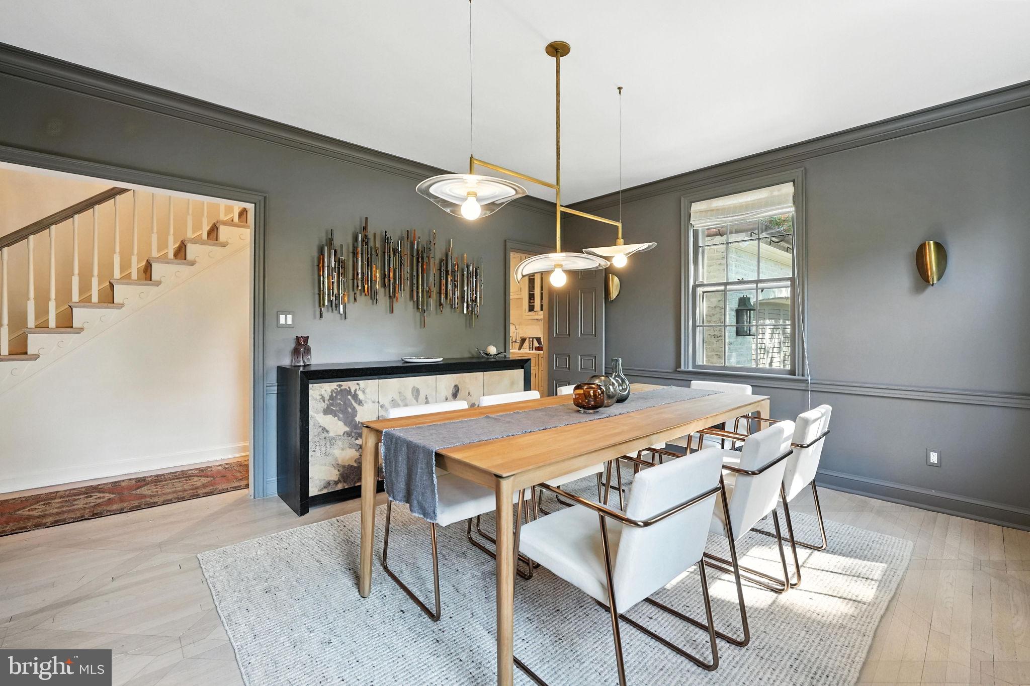 1804 45th Street Northwest Washington, DC 20007 - Photo 12 of 52 a view of a dining room with furniture window and wooden floor