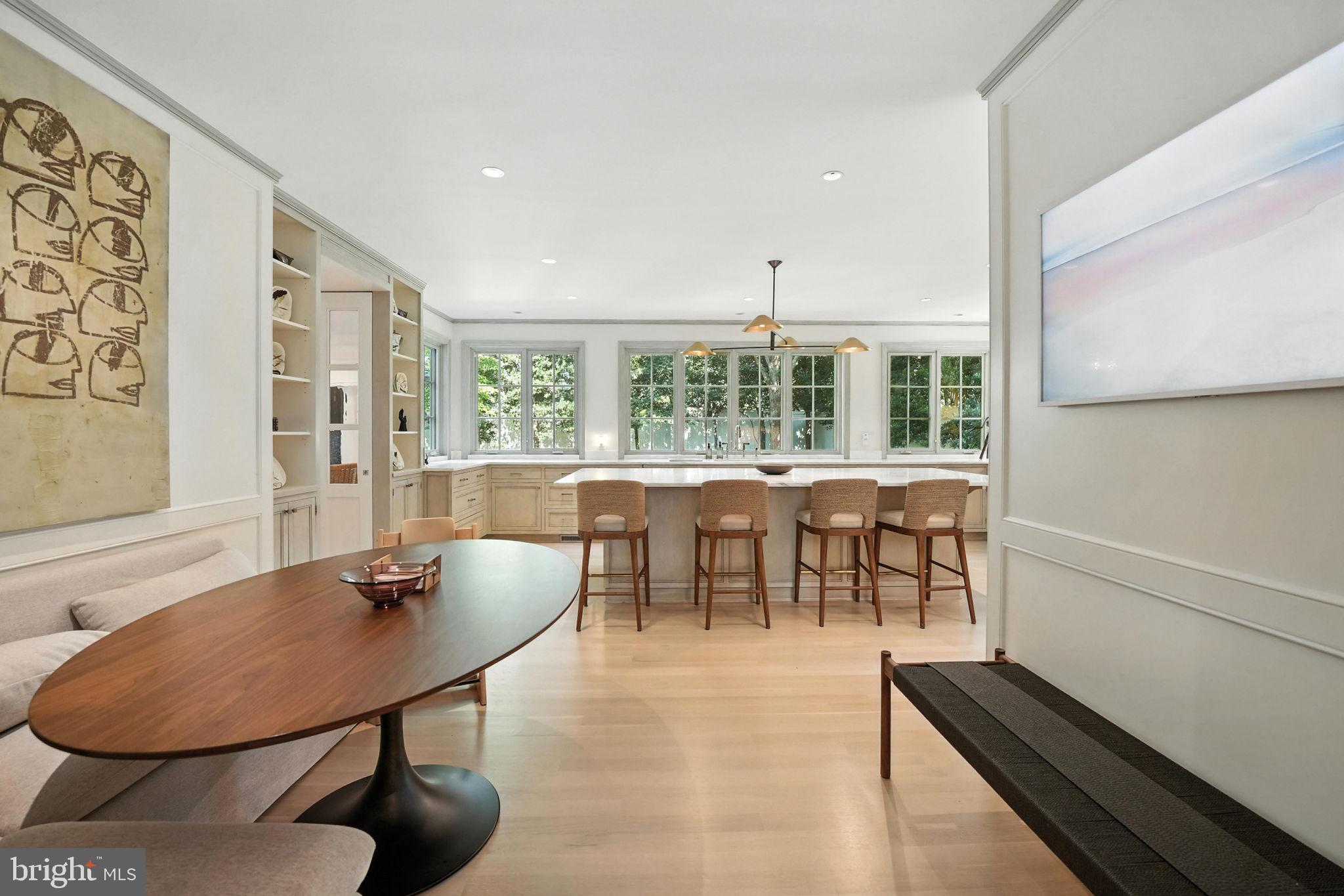 1804 45th Street Northwest Washington, DC 20007 - Photo 14 of 52 a dining room with furniture and a large window