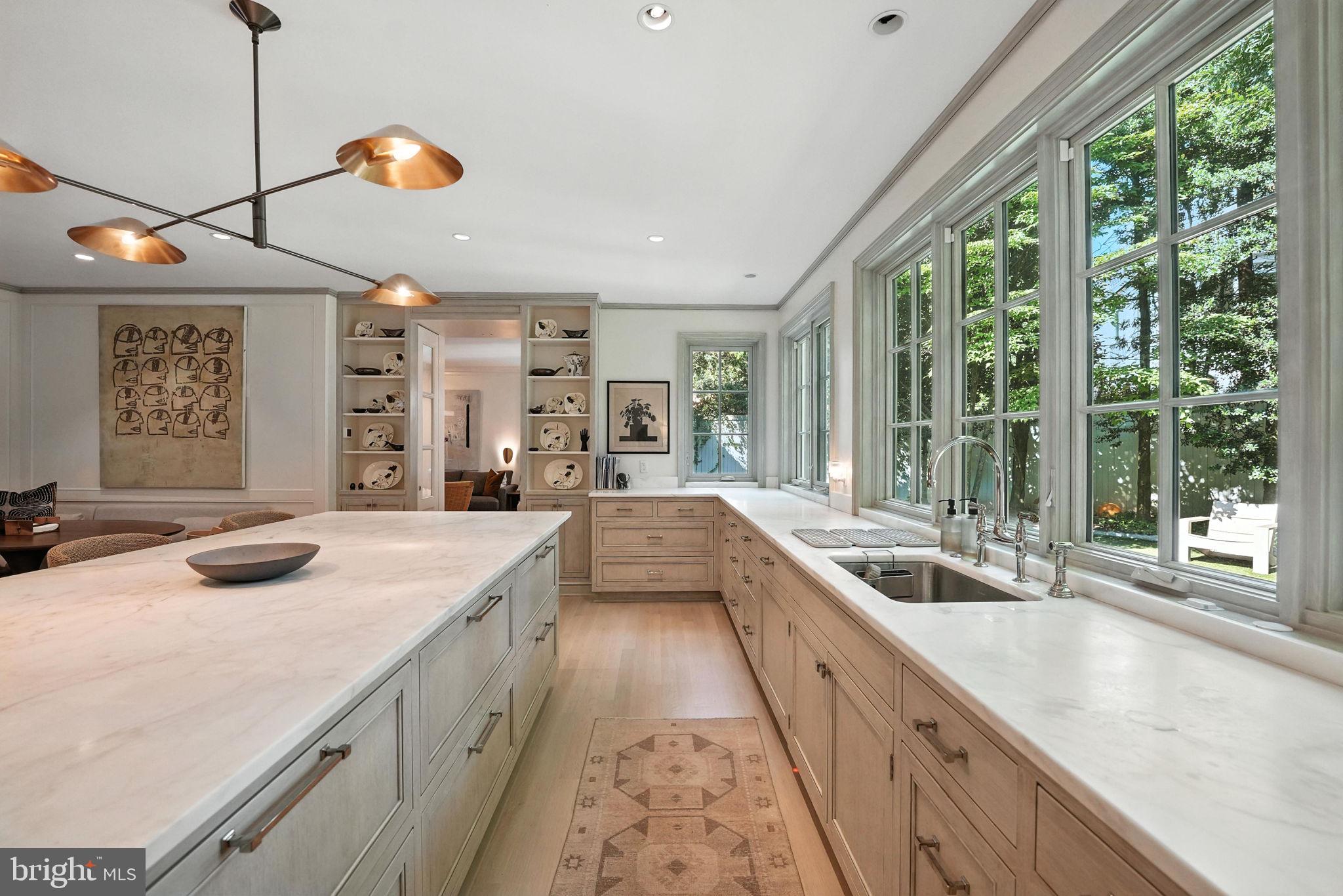 1804 45th Street Northwest Washington, DC 20007 - Photo 17 of 52 a view of a kitchen with a sink and large windows
