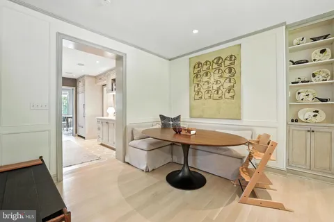 a view of a livingroom with furniture and a window