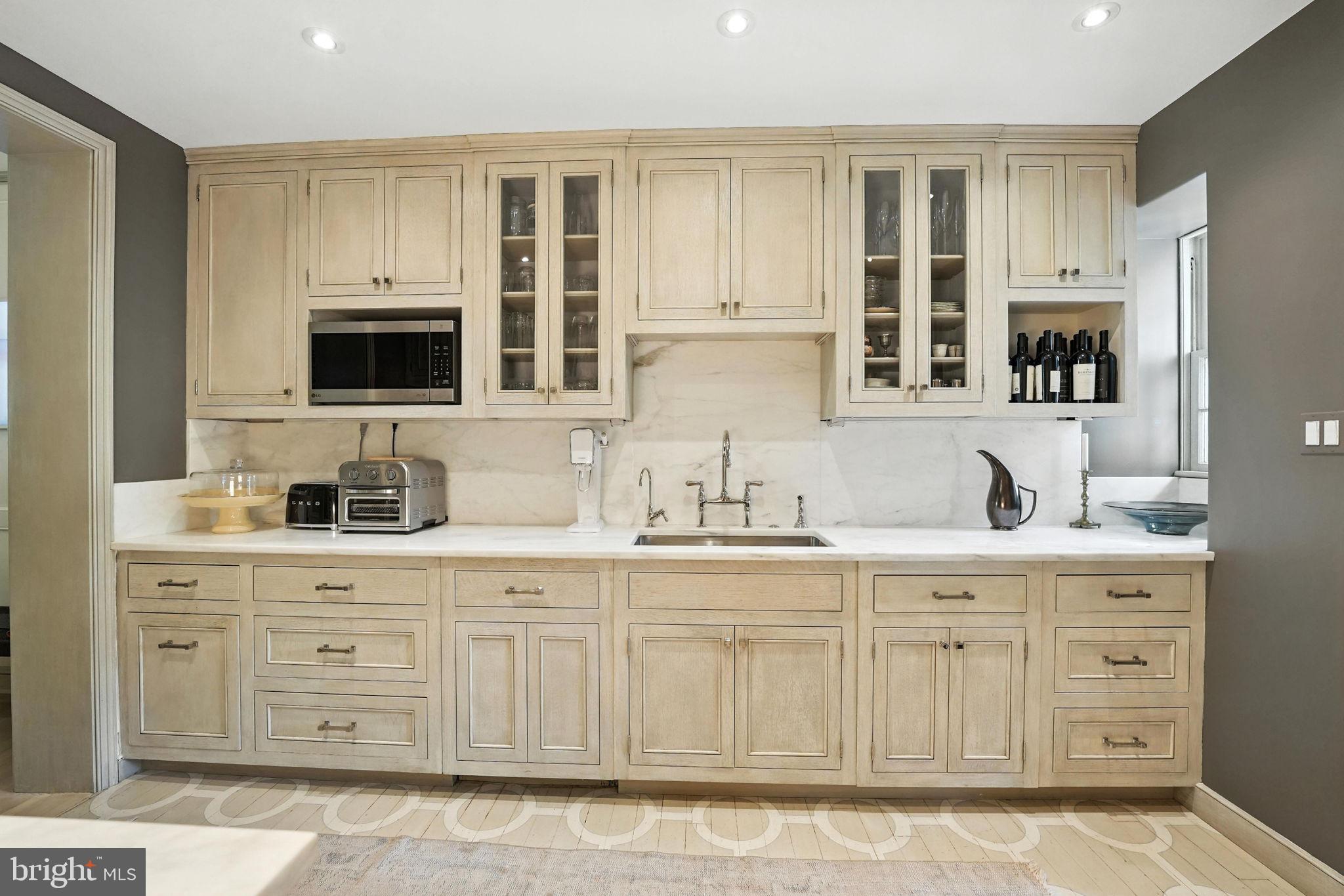1804 45th Street Northwest Washington, DC 20007 - Photo 19 of 52 a spacious bathroom with stainless steel appliances granite countertop a sink and cabinets