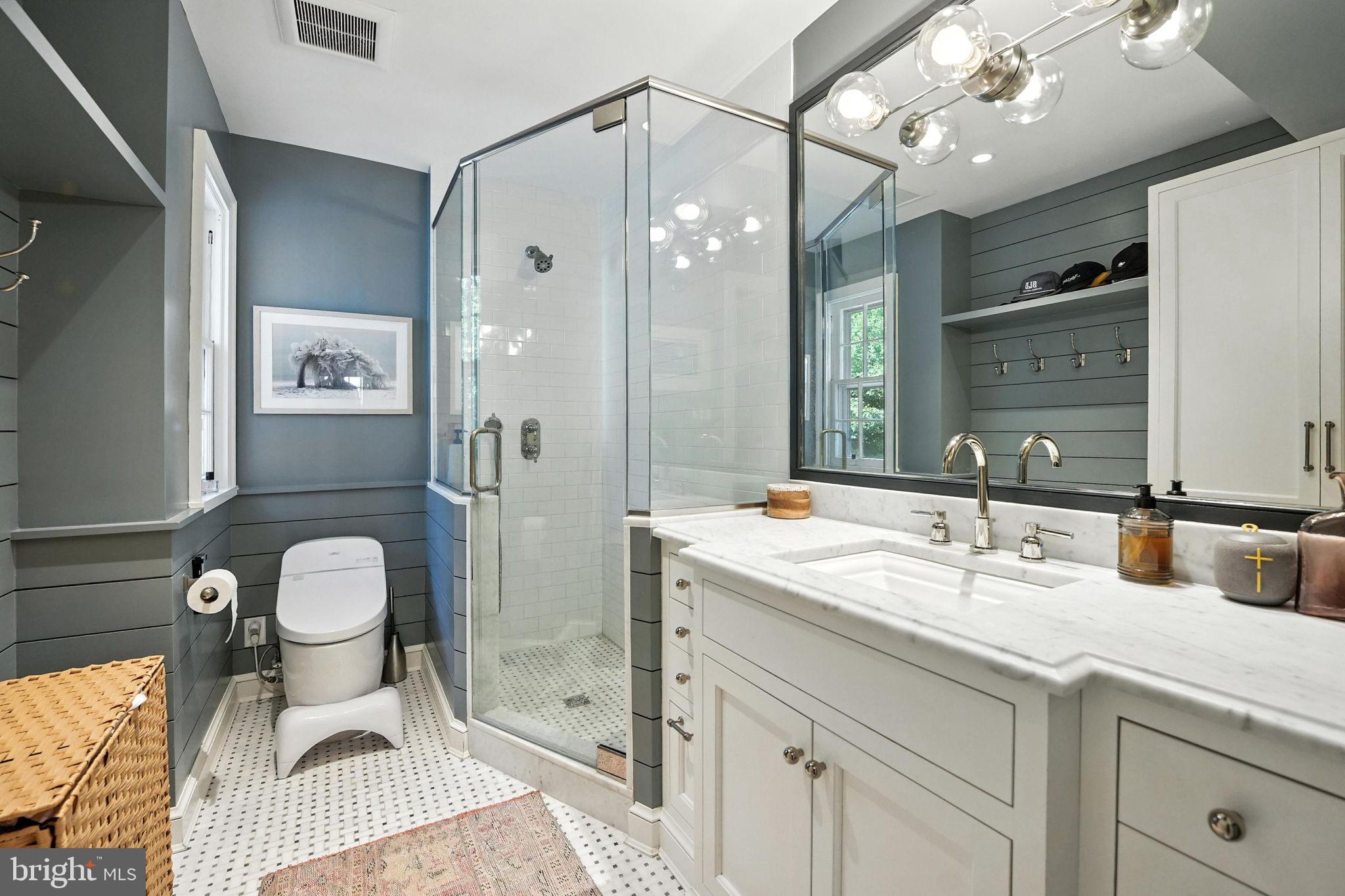 1804 45th Street Northwest Washington, DC 20007 - Photo 24 of 52 a bathroom with a sink vanity granite and toilet