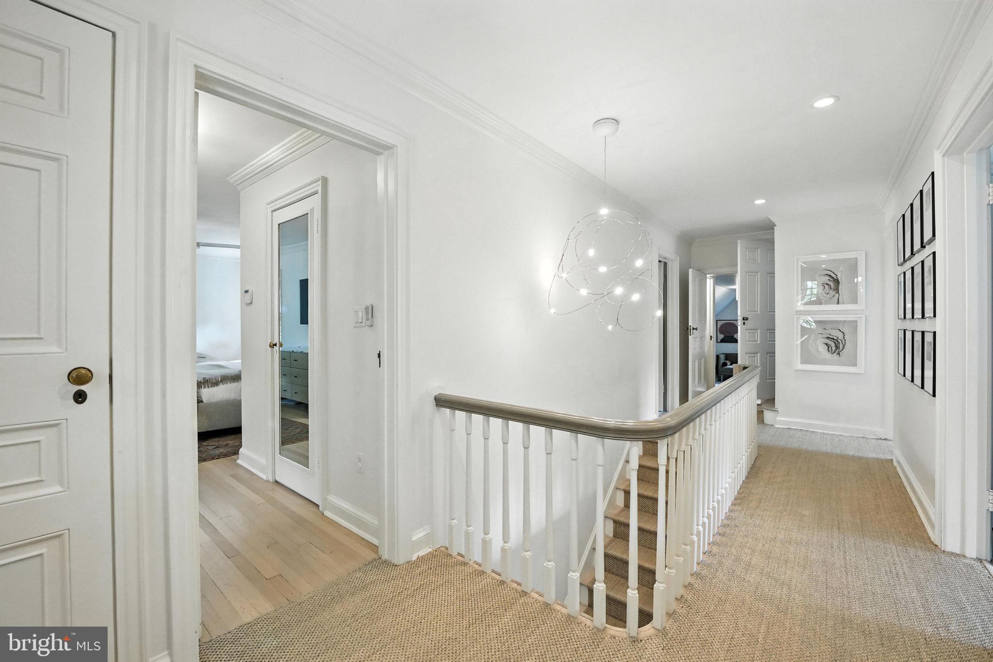 1804 45th Street Northwest Washington, DC 20007 - Photo 26 of 52 a view of a hallway with wooden floor and entryway