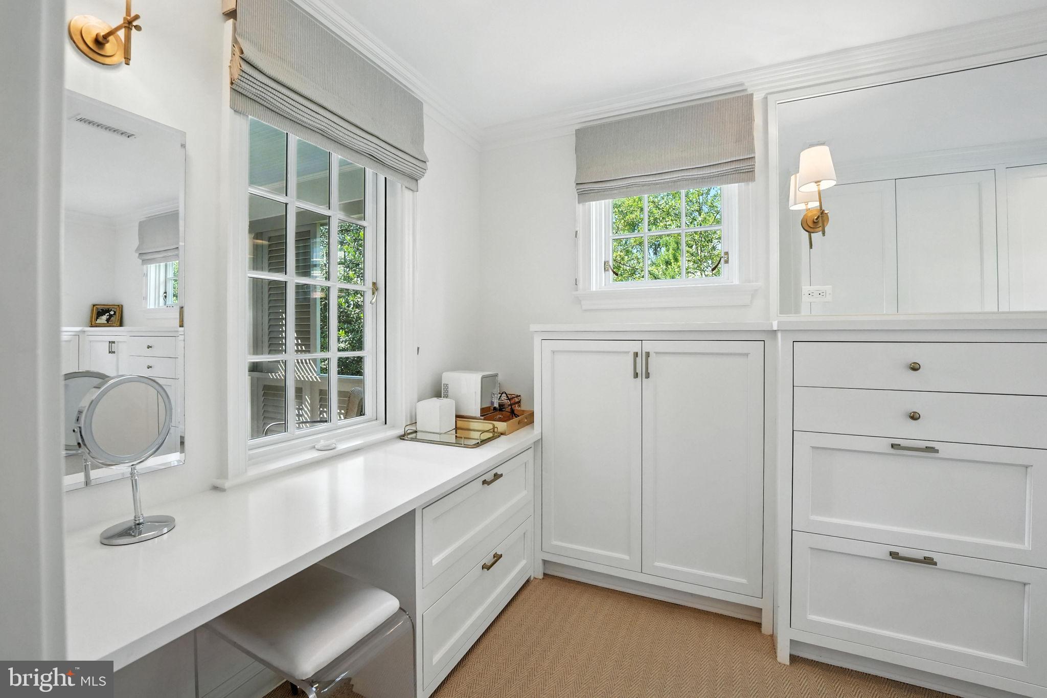 1804 45th Street Northwest Washington, DC 20007 - Photo 29 of 52 a room with a window cabinet and mirror