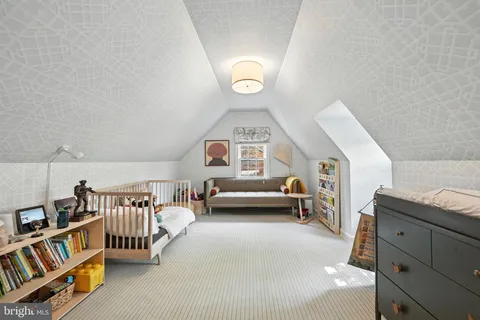 a view of a livingroom with furniture and windows