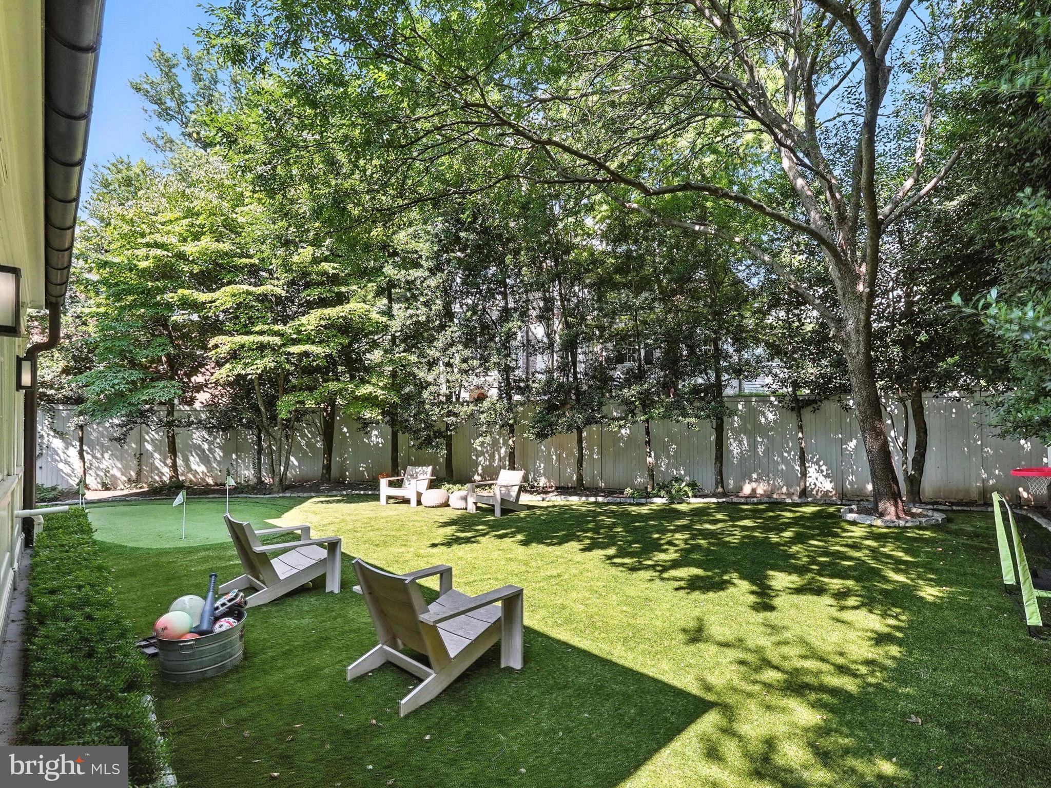 1804 45th Street Northwest Washington, DC 20007 - Photo 50 of 52 a garden with trees in the background