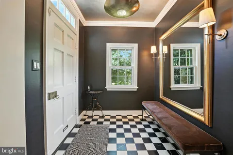 a room with a window and a bathtub