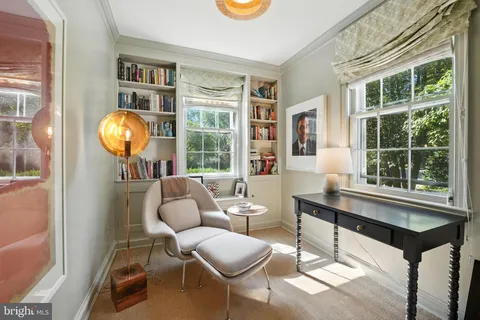 a view of a livingroom with furniture and window