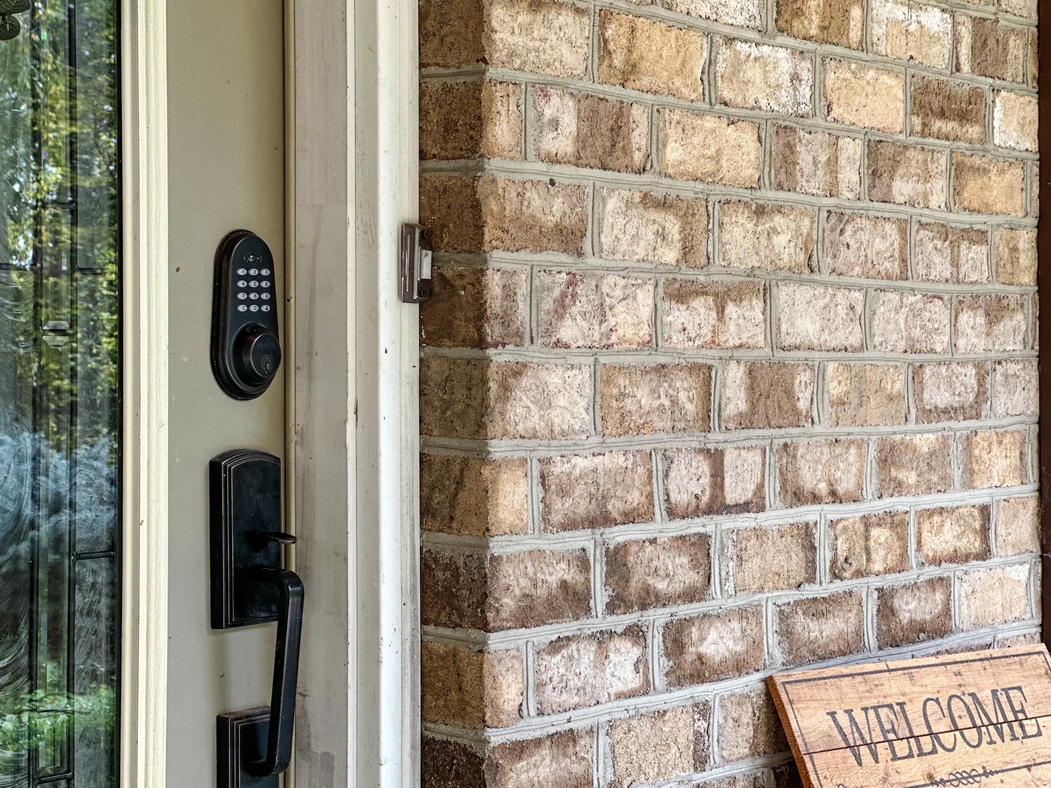 1426 Roman Road Mount Sidney, VA 24467 - Photo 14 of 46 a front view of a house with a door and a window