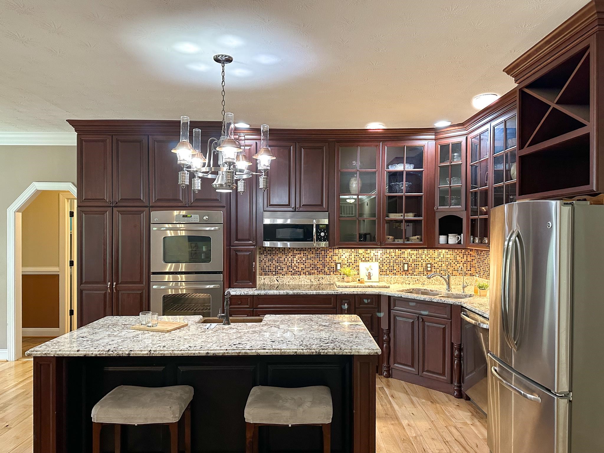 1426 Roman Road Mount Sidney, VA 24467 - Photo 20 of 46 a kitchen with center island and stainless steel appliances