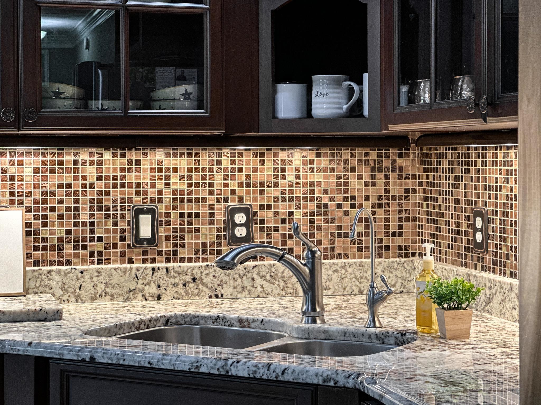 1426 Roman Road Mount Sidney, VA 24467 - Photo 28 of 46 a kitchen with a sink and a microwave