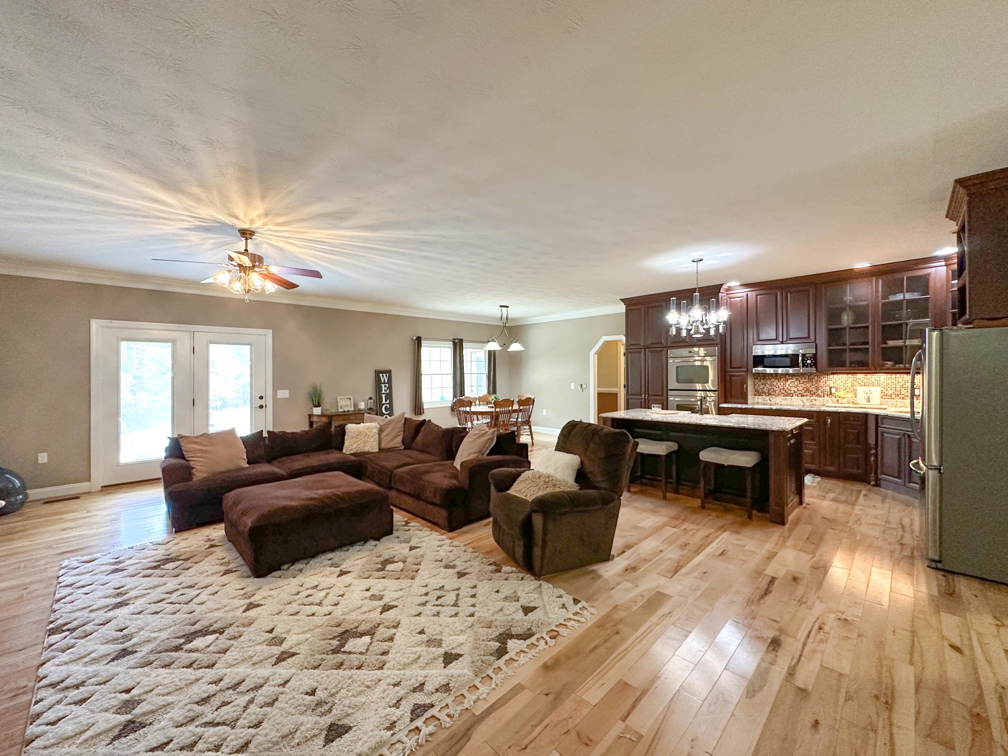 1426 Roman Road Mount Sidney, VA 24467 - Photo 29 of 46 a living room with furniture and a wooden floor