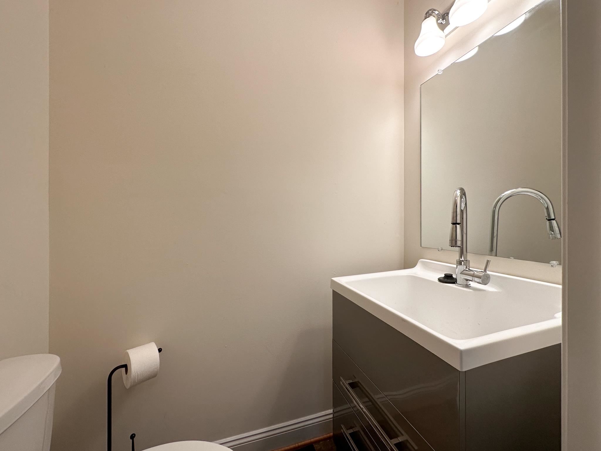 1426 Roman Road Mount Sidney, VA 24467 - Photo 45 of 46 a bathroom with a sink and a mirror