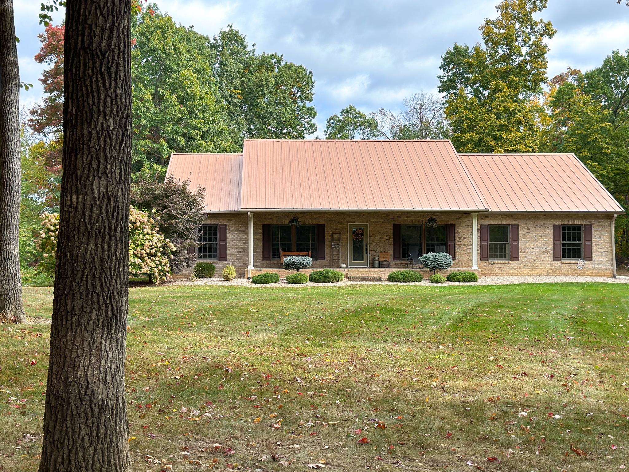 1426 Roman Road Mount Sidney, VA 24467 - Photo 6 of 46 a front view of a house with swimming pool having outdoor seating