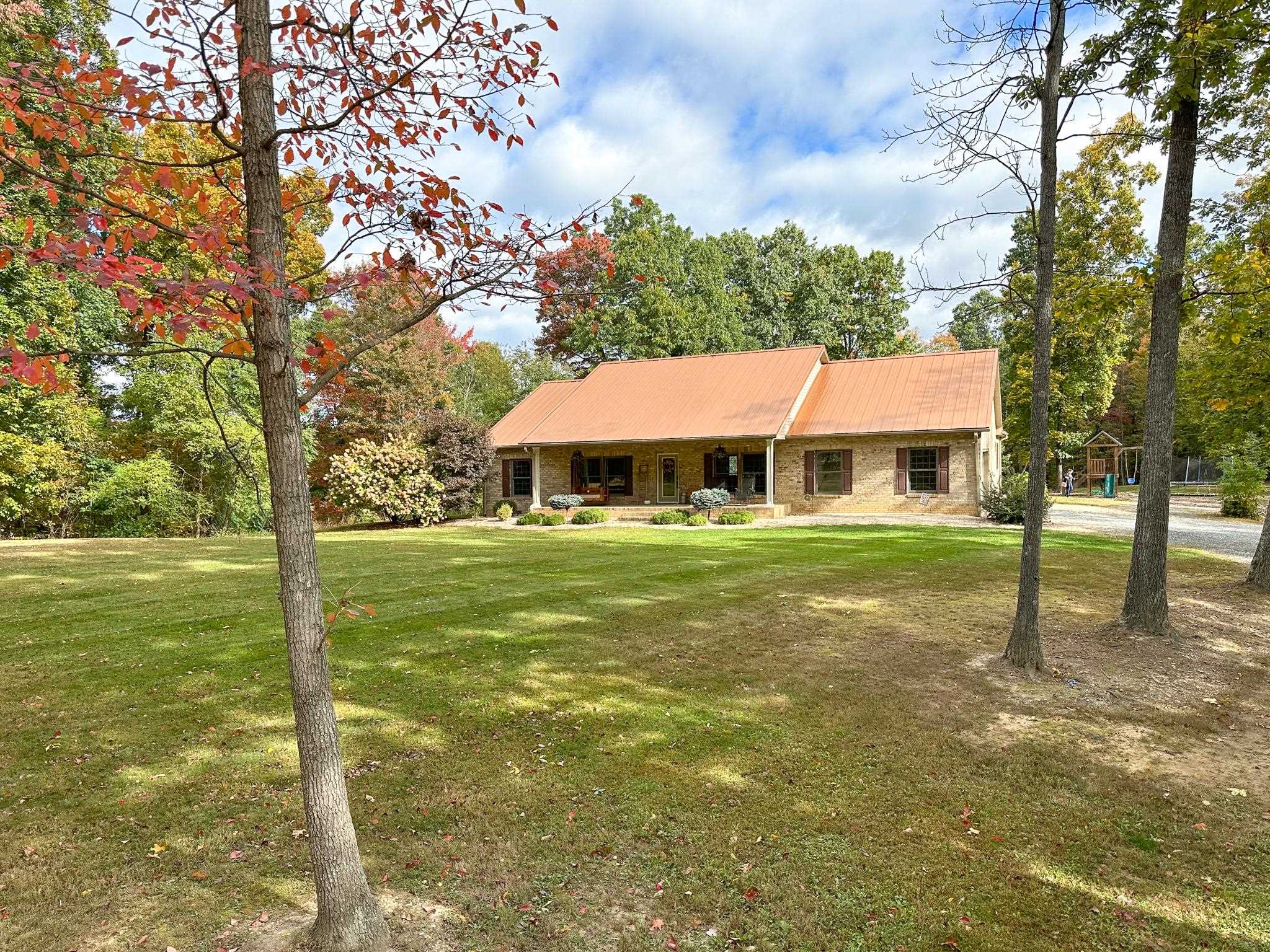 1426 Roman Road Mount Sidney, VA 24467 - Photo 8 of 46 a front view of a house with garden